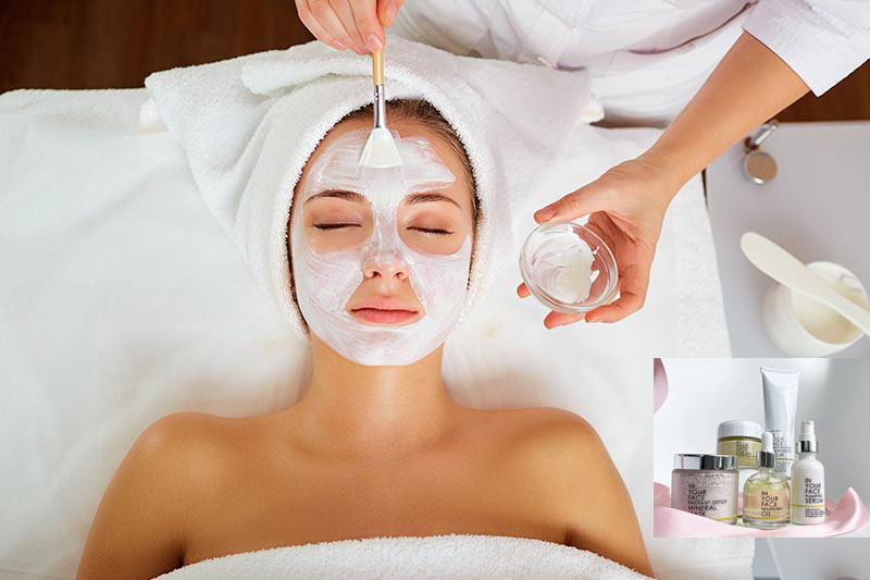 Woman receiving facial with In Your Face skincare products