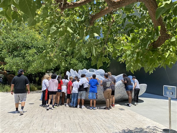 Children in front of artwork at the Disney Center