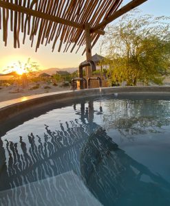 Water in oasis tub at sunset